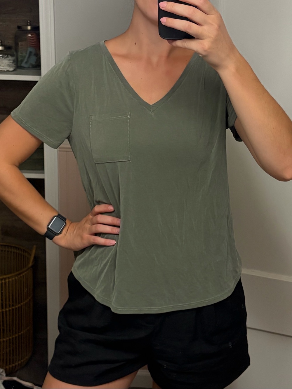 Green V-neck tee